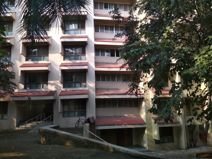 Figure 6: A view of the two hostels (hostel V on the left for boys and hostel 6 on the right for girls) on TISS' Nauroji Campus. The big windows allow for sufficient natural light and ventilation.